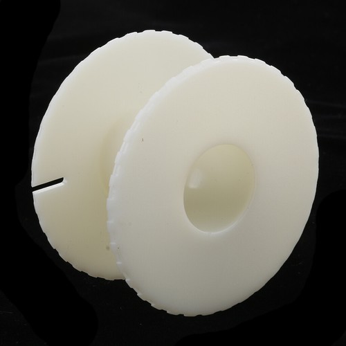 Empty plastic wire spools - empty,